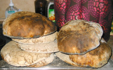 A pile of home made bread.